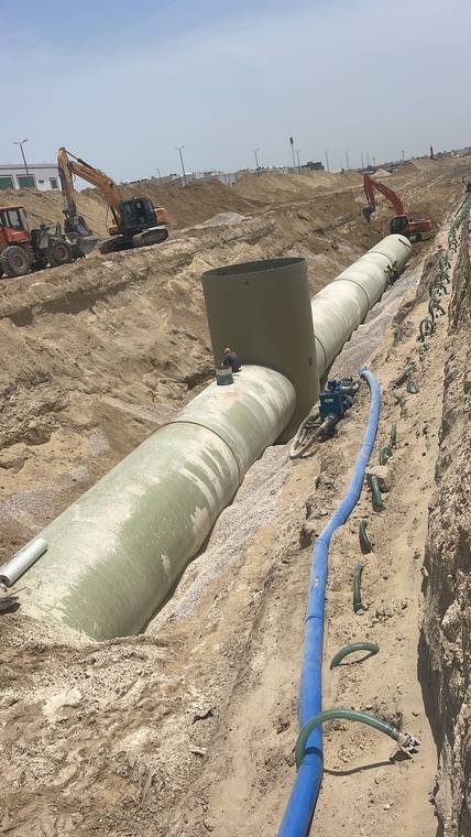 شركة وادي البناء الحديث – أنبوب GRP كبير القطر مع خط ضخ مساند لأعمال خفض المنسوب.